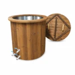 Eistonne 1 Icetub Thermoholz (Ø90 cm, Edelstahl AISI316) – kompaktes rundes Thermoholz-Kaltwasserbecken mit Edelstahl-Innenwanne aus AISI 316, Holzdeckel, Spannbändern und Ablasshahn auf weißem Hintergrund.